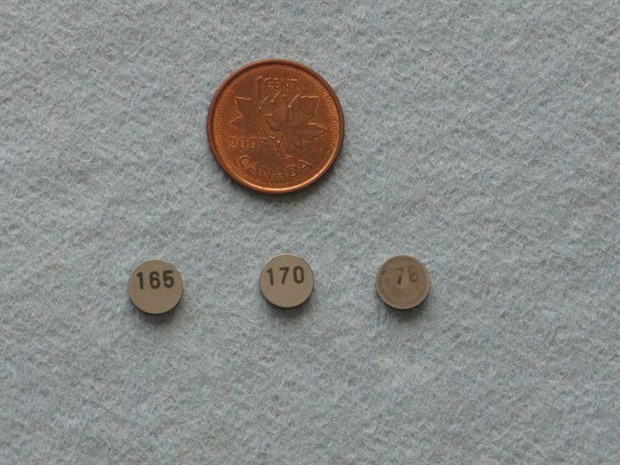 Various thicknesses of valve shims - two new ones and one used one (178)