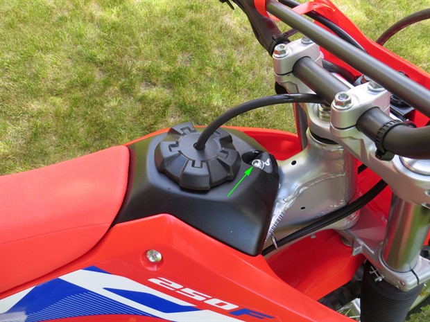 Front fuel tank mounting bolt