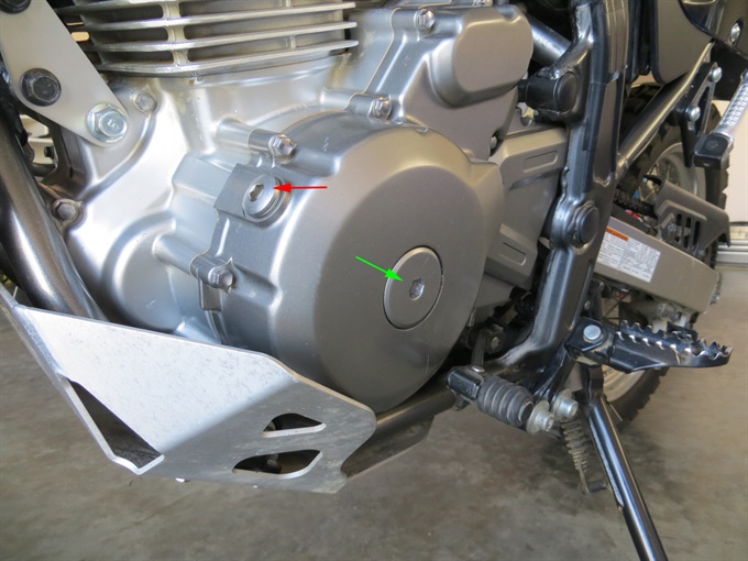 Generator cover plug (centre) and valve timing inspection plug (on top)