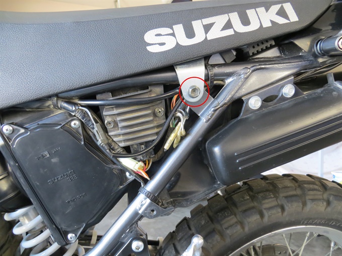 Location of seat bolts (left side shown)