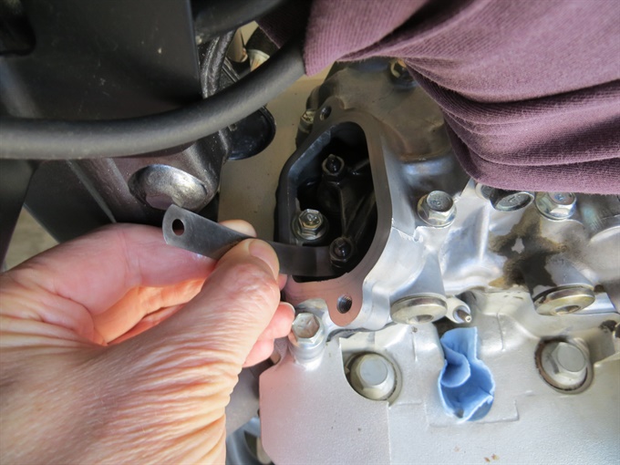 Measuring valve clearance (exhaust, left side)