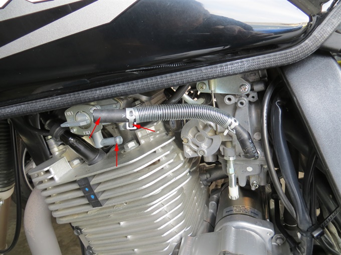 Fuel line disconnected at fuel tank (carb-end clamp also repositioned)