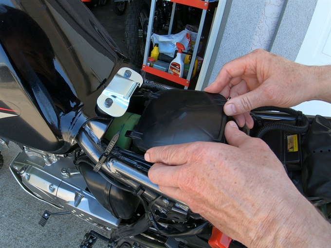 DR200SE - installing the air box cover - aligning the tabs