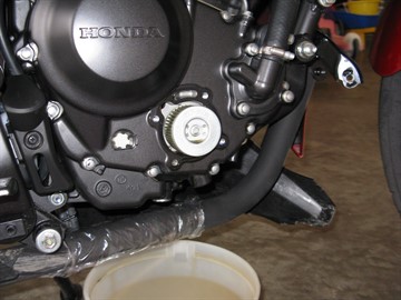 Oil filter cover removed - CBR250RA